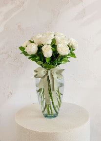 Pure Grace – 12 White Roses in a Vase